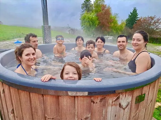 The hot tub at the end of the day, steam rising off the water